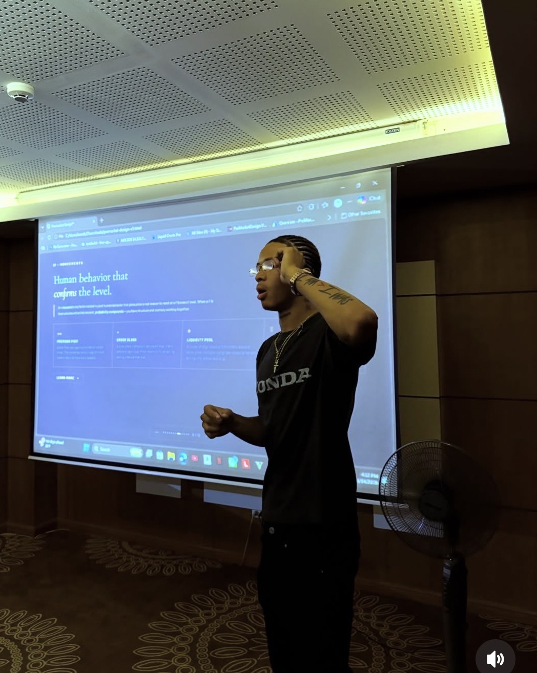 Azekiel Shockley teaching structure on a projector